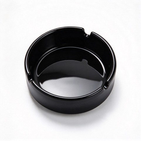 Deep round-cavity ashtray with a glossy solid-black glaze