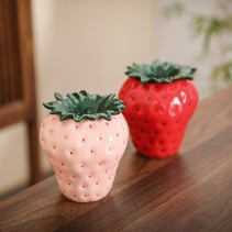 Dust-proof ashtray in a cute pinkish strawberry design