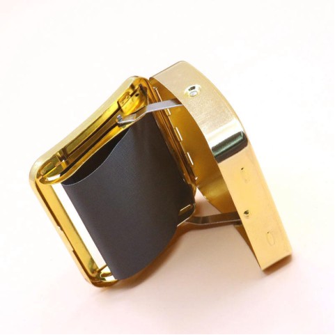 Gold-colored vintage-style engraved metal manual cigarette rolling machine