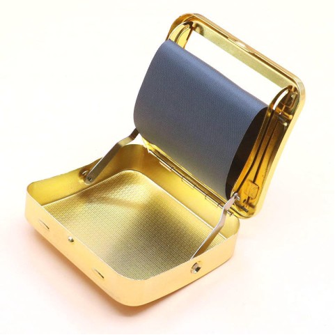 Gold-colored vintage-style engraved metal manual cigarette rolling machine
