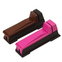 Portable manual pull-style cigarette rolling machine in a brown and black color scheme